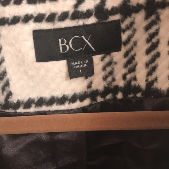 A darling black and white jacket. It’s just too small for me. - Picture 2 of 2